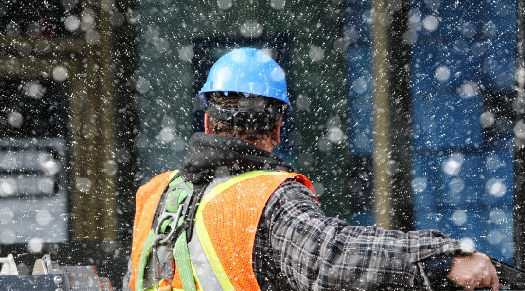 construction worker working in the snow