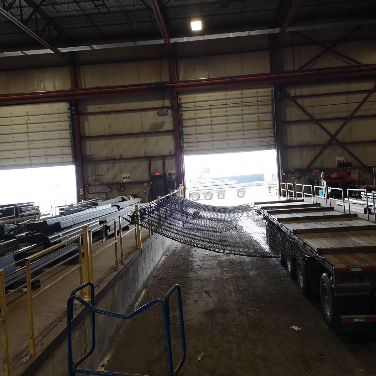 truck netting set up in a warehouse