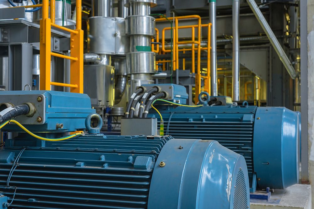 Electric Industrial generator inside power plant closeup