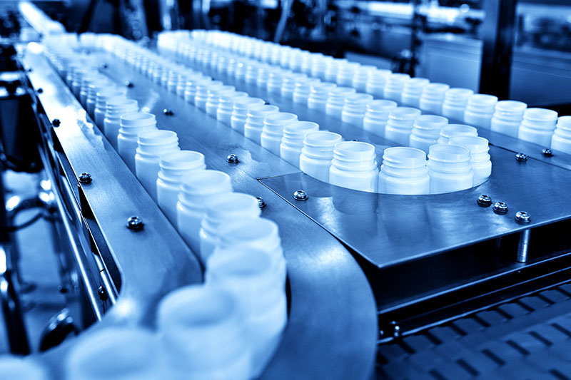 Medicine bottles in production line